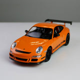 سيارة ويلي بورش 911 جي تي 3 آر إس طراز 1:24 مصبوبة - سلسلة NEX إصدار Orange Track Performance
