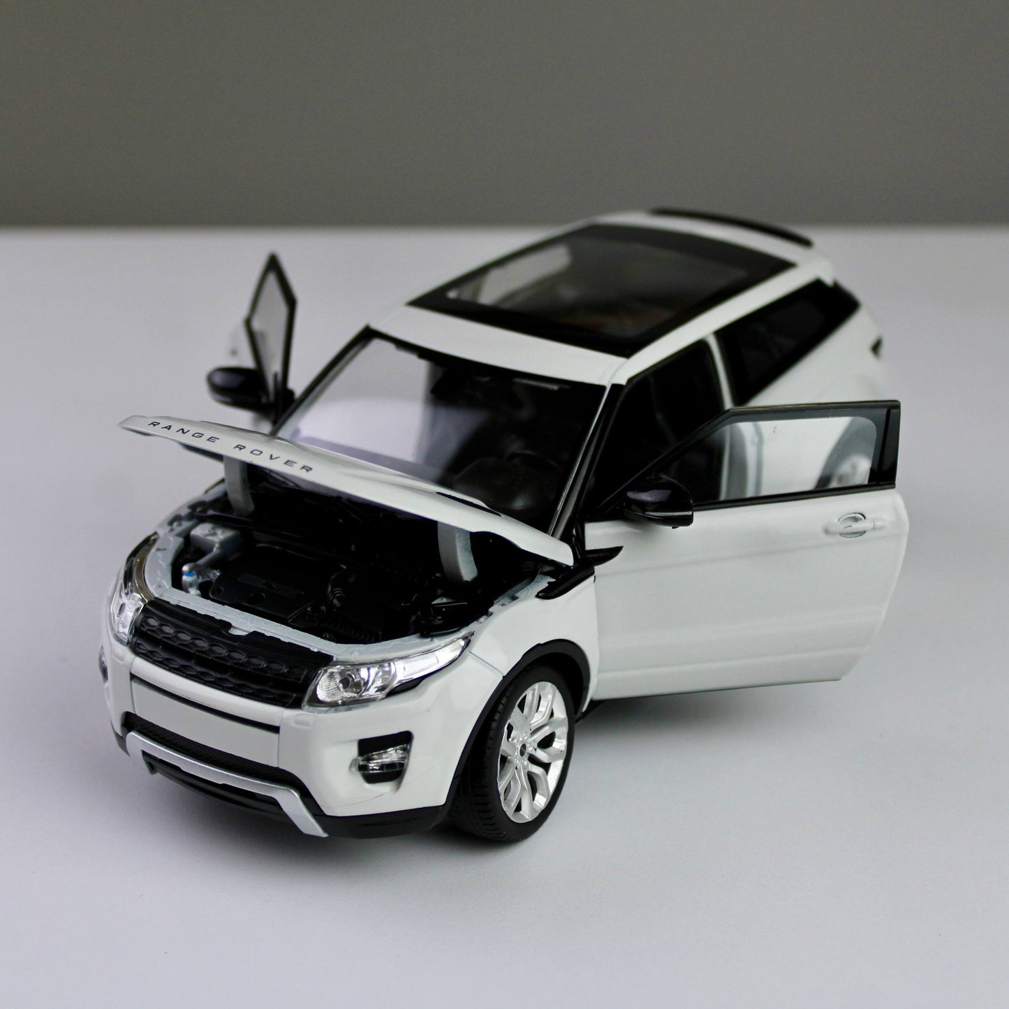 Welly Land Rover Range Rover Evoque مجسم سيارة رياضية متعددة الاستخدامات مصبوب بالقالب بمقياس 1:24